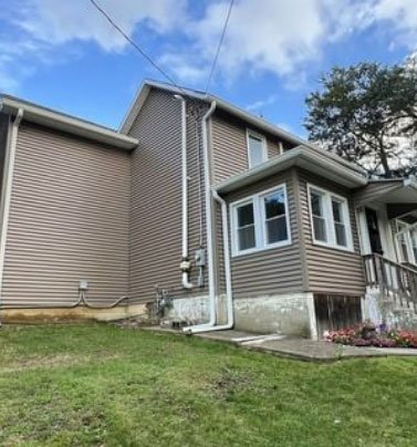 roofing and siding contractors NJ installing James Hardie siding