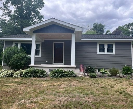 After James Hardie Plank Aged Pewter with Tongue and Groove cedar porch soffit and James Hardie Shingle in Iron Gray
